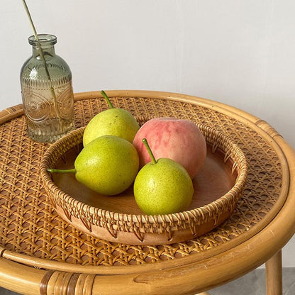 Natural wooden platter with handwoven wicker pattern