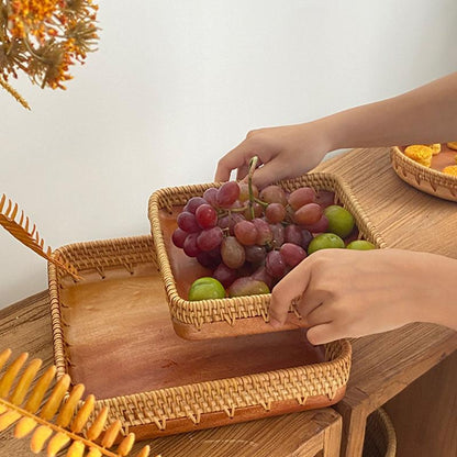 Natural wooden platter with handwoven wicker pattern