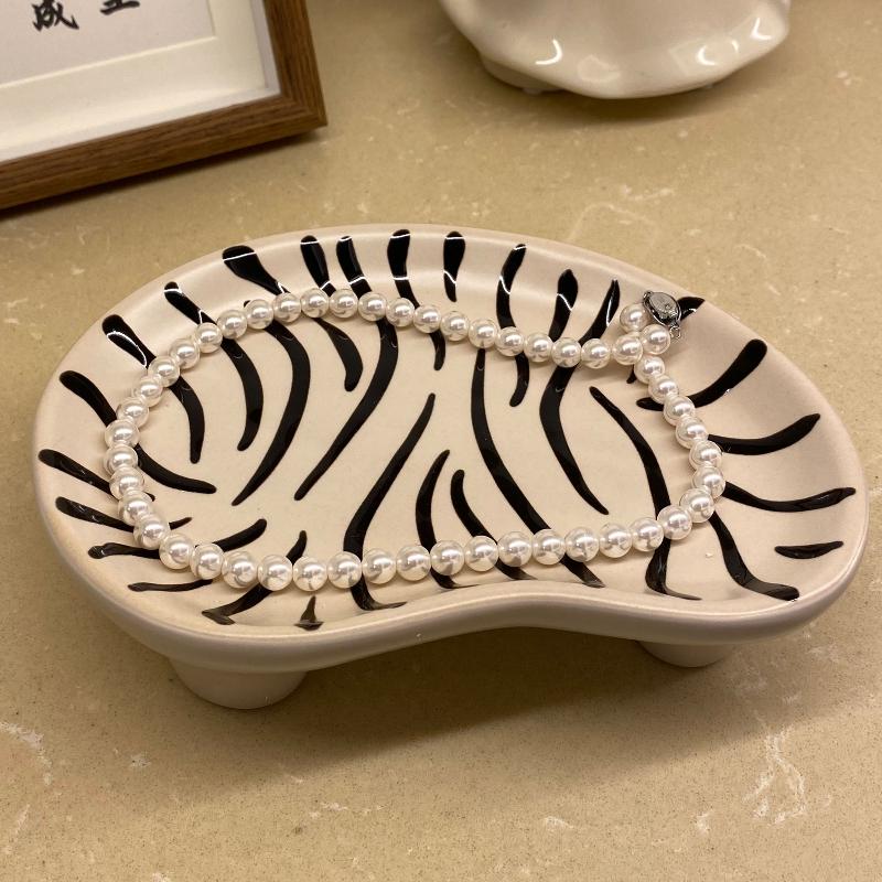 Zebra and leopard print ceramic jewelry plate